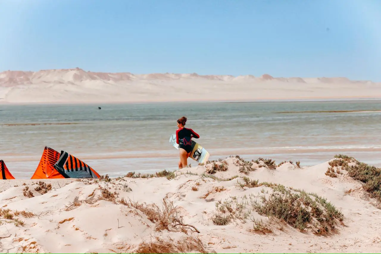 Kitesurfer student riding in the flat shallow waters of Dakhla lagoon