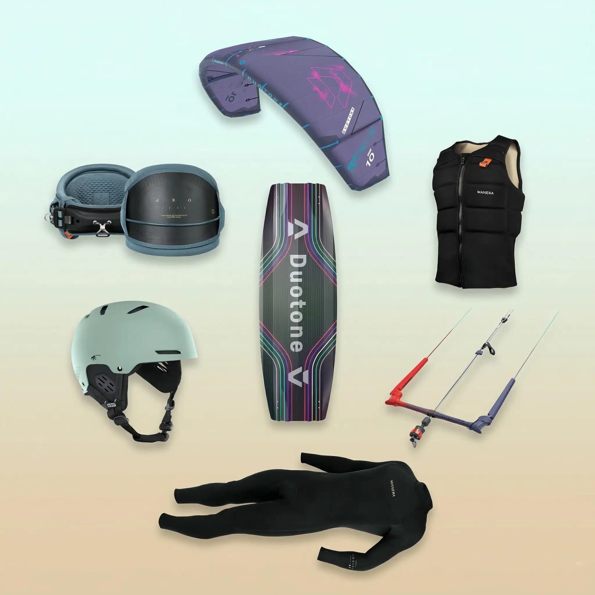 Complete kitesurf rental gear from Bluboarding including kite, bar, harness, board and pump laid out and ready to ride in Morocco.